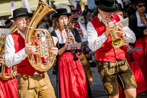 Munich, Germany - September 21, 2019: Opening parade of the world-famous Oktoberfest in Munich with music band in historical and traditional costumes. The Oktoberfest is the biggest beer festival of the world.