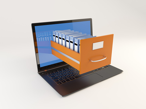 Opening File Cabinet With Laptop Stock Photo Download Image Now