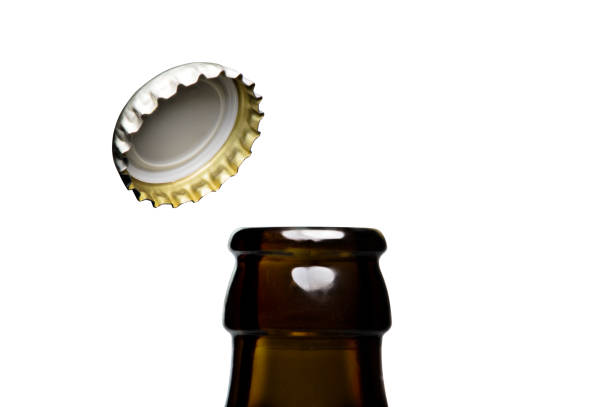 Opening of beer cap stock photo