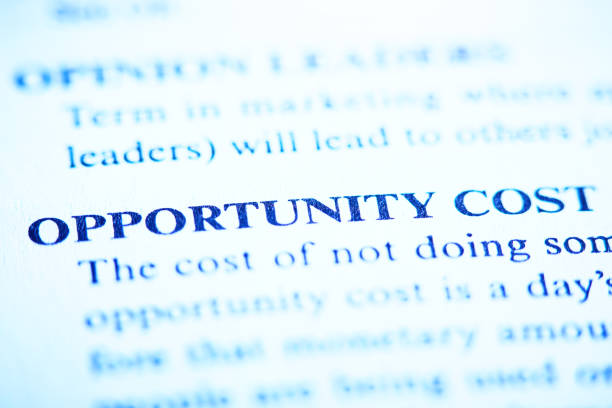 Opportunity Cost defined in a business dictionary stock photo