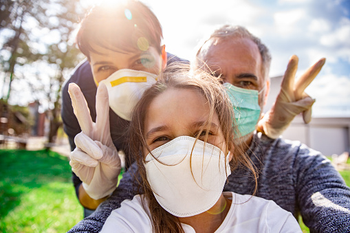 Optimistic Family selfie during Coronavirus emergency