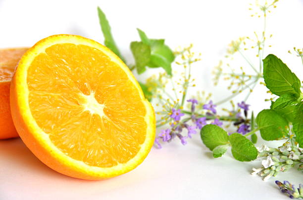 orange and herbs stock photo