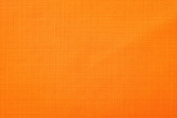 オレンジのファブリックの背景 - テーブルクロス ストックフォトと画像