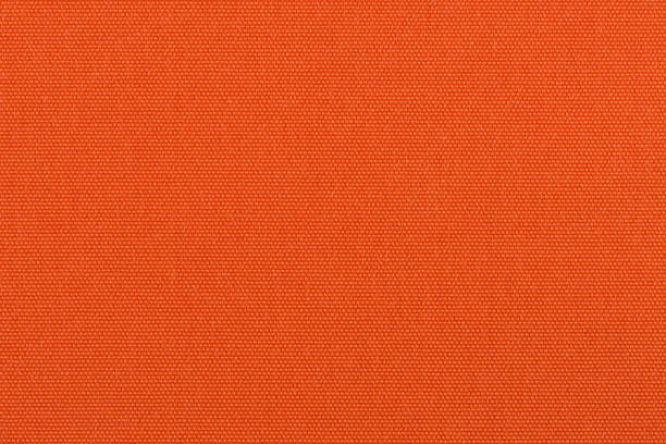 texture in tessuto arancione - tovaglietta foto e immagini stock