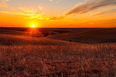 istock Orange glow of a sunset in Kansas Flint Hills 477368769