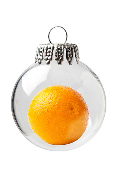 Orange in a Christmas Ornament stock photo