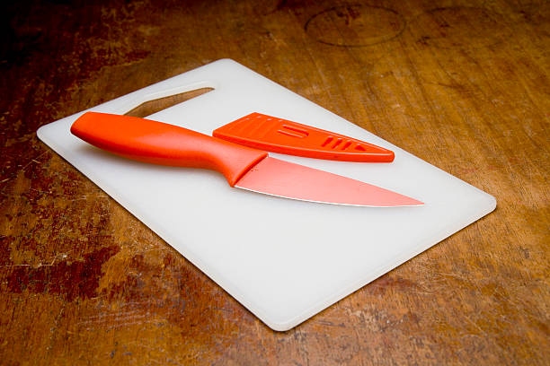 Orange knife stock photo