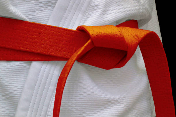 Orange obi sash Close-up on an orange belt tied around a kimono. bushido lifestyle stock pictures, royalty-free photos & images