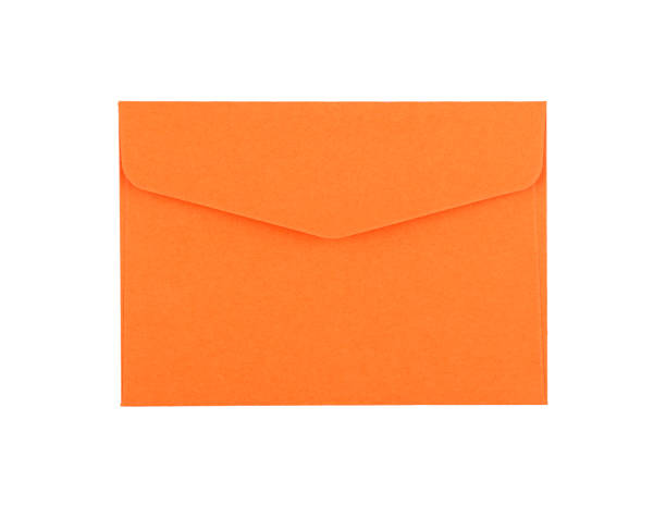 Orange paper envelope isolated on white stock photo