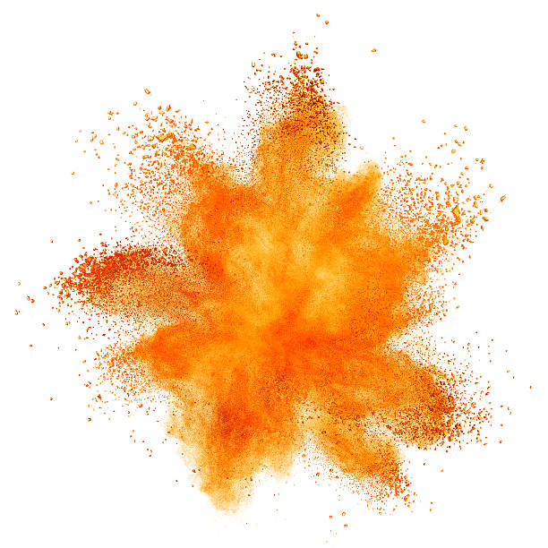 orange powder explosion, isoliert auf weiss - explodieren stock-fotos und bilder
