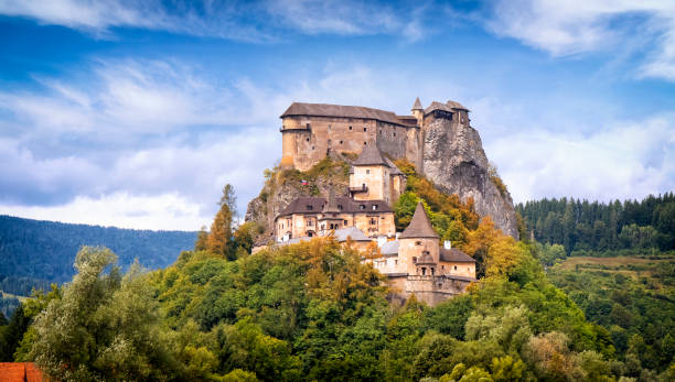 Orava Castle, Slovakia Orava Podzamok, Slovakia- August 17, 2019: Orava Castle is situated on a high rock above Orava river in the village of Oravský Podzámok, Slovakia. The castle was built in the Kingdom of Hungary in the thirteenth century slovakia stock pictures, royalty-free photos & images