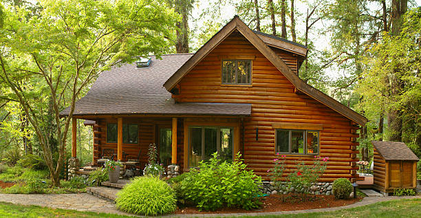 Oregon Forest Modern Log Cabin Oregon Forest Modern Log Cabin cottage stock pictures, royalty-free photos & images