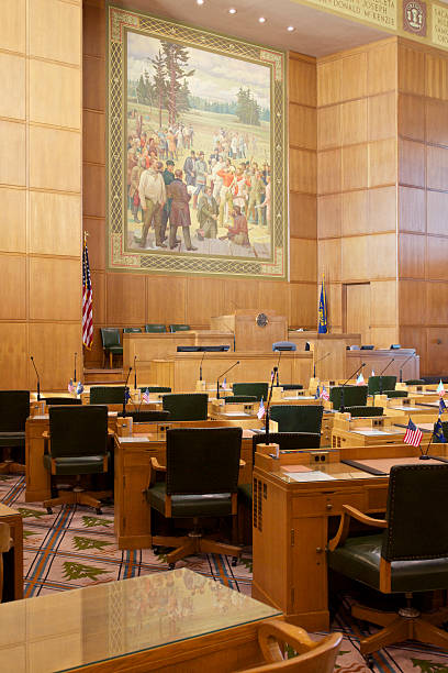 Oregon House of Representatives State Capital Interior Looking at the Oregon House of Representatives leadership area of chamber with a mural  on the wall. Located at the Oregon State Capital in Salem, Oregon. oregon state capitol stock pictures, royalty-free photos & images