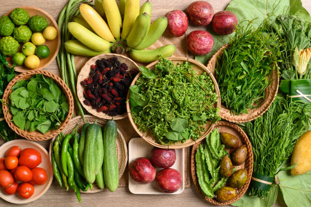 Organic Southeast Asian vegetables and fruits from local farmer market, Northern of Thailand stock photo