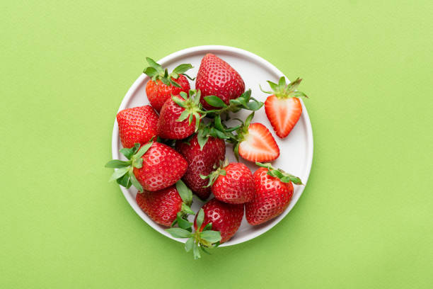 Organic strawberries on a plate stock photo
