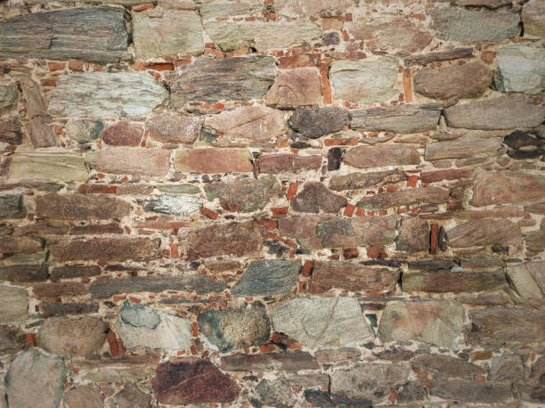 Original stone wall from the fifteenth century stock photo
