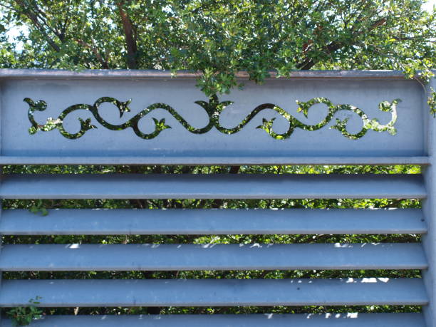Ornamental Fence With Changing Backgrounds stock photo