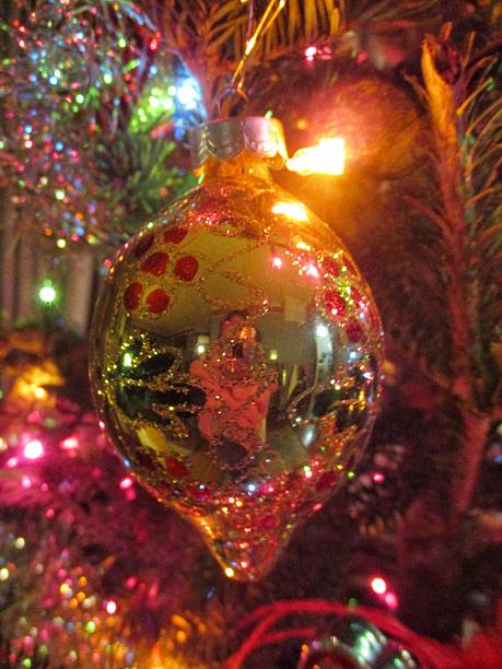 Ornate Sparkling Christmas Ornament on a Christmas Tree stock photo