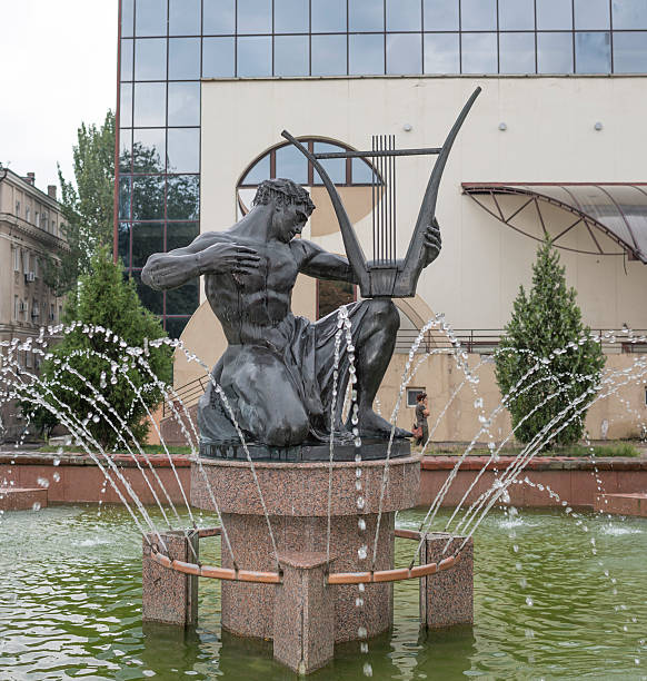 orpheus sculpture in the fountain near the theater philharmonic - orfeus bildbanksfoton och bilder
