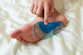 istock Orthopedic insoles for children's feet. Treatment of flatfoot. 1078959182