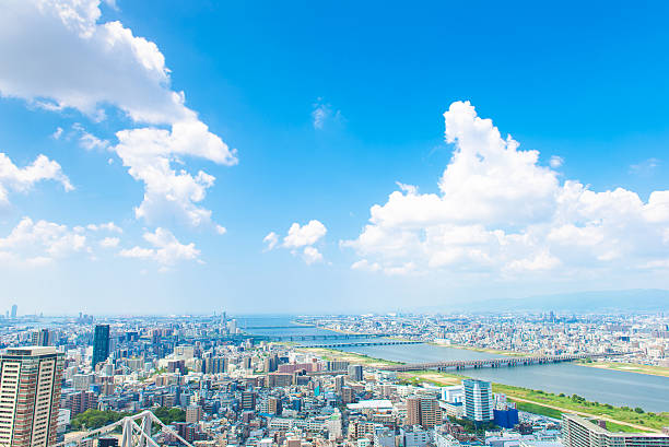 osaka city landscape, japan - stadje stockfoto's en -beelden