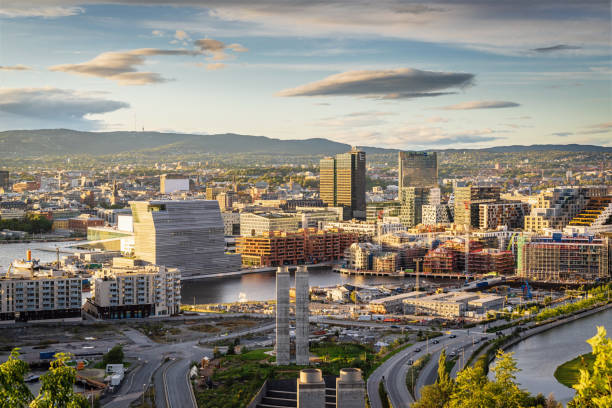 Oslo City in Sunset Light Norway View from above Ekebergparken over Sorenga District towards Oslo Cityscape with Oslo Harbor in late afternoon light close to twilight. Oslo City, Norway, Scandinavia, Europe oslo stock pictures, royalty-free photos & images