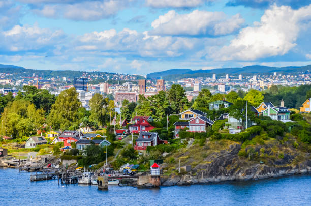 Oslo the city in the fjord View of Oslo between city and typical nordic cottage norway stock pictures, royalty-free photos & images