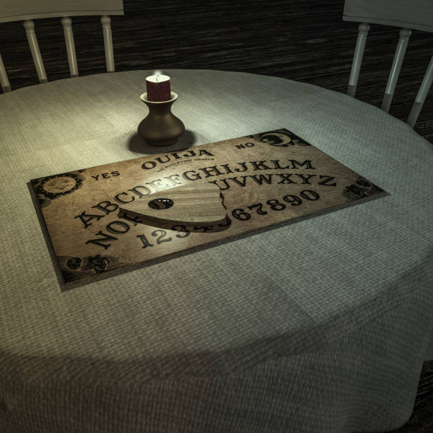 ouija table ouija table in a dark room 3d illustration ouija board stock pictures, royalty-free photos & images