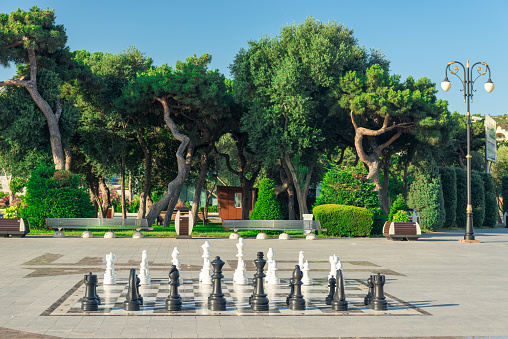 Outdoor giant chess in public area zone, Close up big pieces of street chess in the park