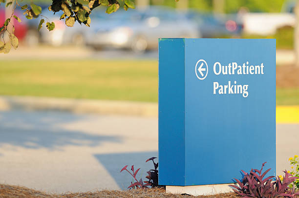 Outpatient sign for parking stock photo