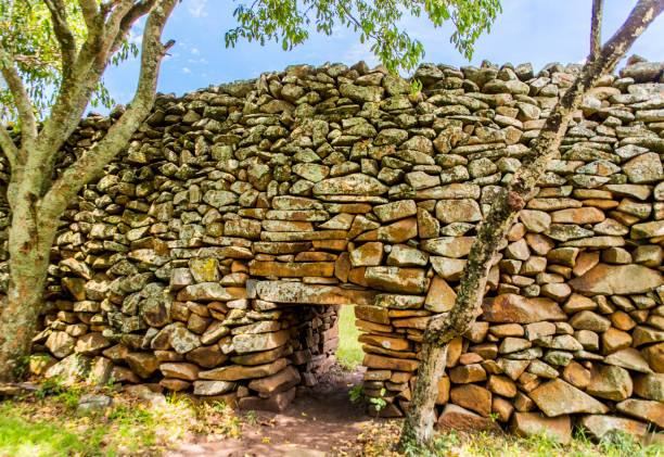 Outside view of dry stone wall and entrance at rural Thimlich Ohinga, Kenya. stock photo