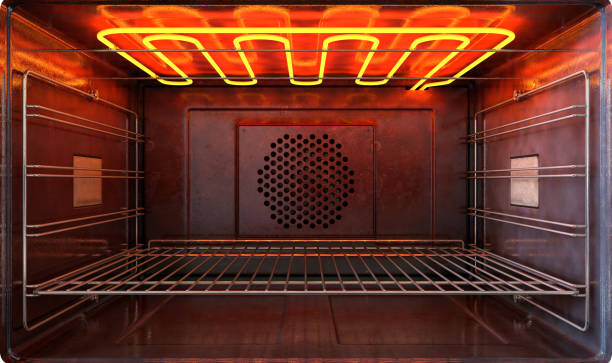 oven new outside view door open An upclose view through the front of the inside of an empty hot operational household oven with a glowing element and metal rack - 3D render oven stock pictures, royalty-free photos & images
