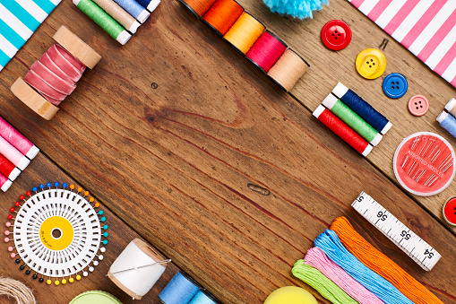Overhead Flat Lay Of Sewing Items Arranged On Wood Stock Photo ...