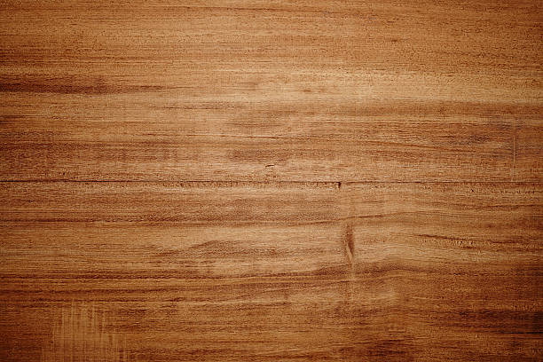 Overhead view of light brown wooden table Directly above view of a wooden background wood grain stock pictures, royalty-free photos & images