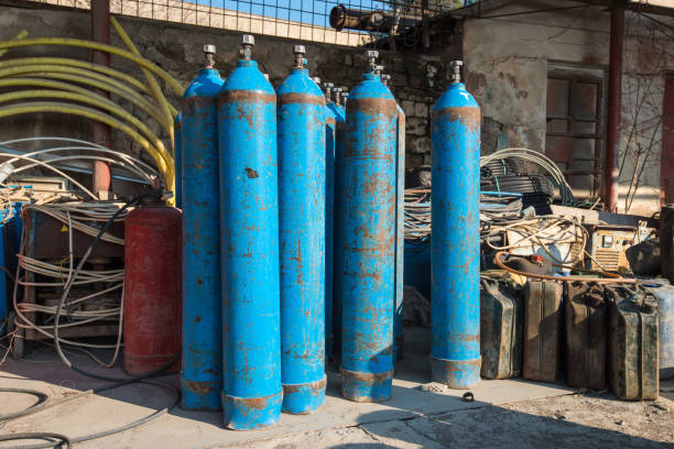 Oxygen tanks on factory yard Oxygen tanks on factory store aqualung diving equipment photos stock pictures, royalty-free photos & images