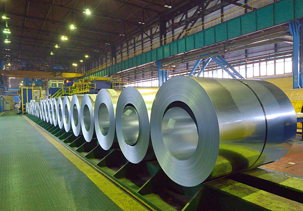 packed coils of steel sheet packed coils of steel sheet inside of plant steel mill stock pictures, royalty-free photos & images
