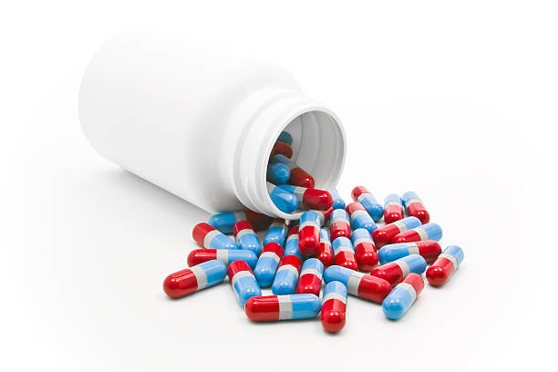 pain killer pills (acetaminophen) poured from bottle - alvedon bildbanksfoton och bilder