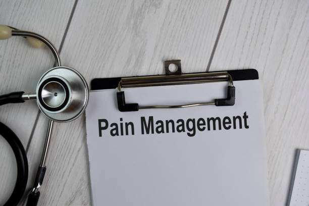 Pain Management text write on a paperwork isolated on office desk. Healthcare/Medical concept stock photo