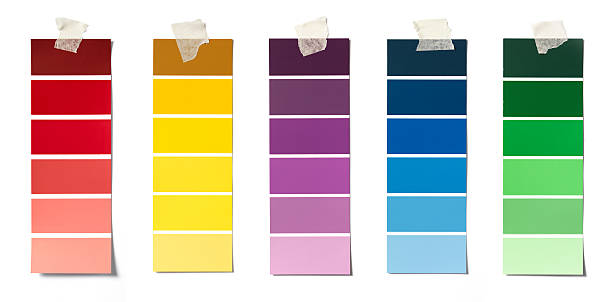 paint swatches group of hanging paint swatches on wall with soft shadow color swatch stock pictures, royalty-free photos & images