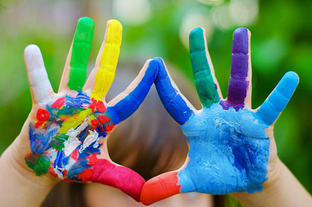 painted colorful hands - eğlence faaliyeti stok fotoğraflar ve resimler