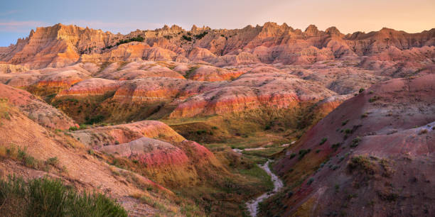 Painted Hills in the South Dakota Badlands Pastel late afternoon colors on display in the Yellow Mounds region of Badlands National park fossil site stock pictures, royalty-free photos & images