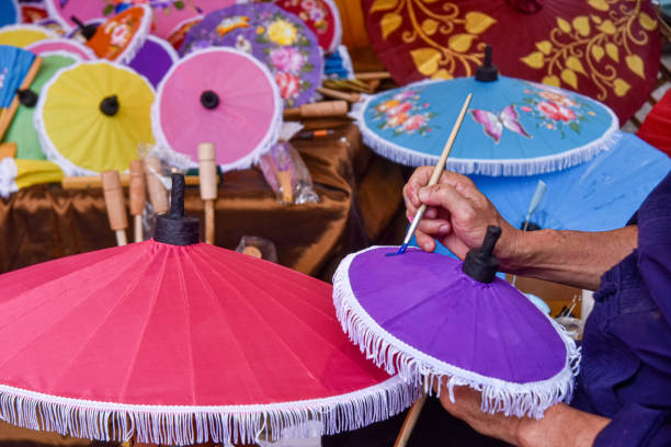 Painting on Handmade umbrella of the village Bo Sang, Chiang mai, Thailand stock photo