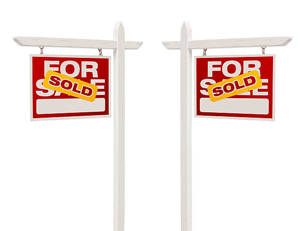 Pair of Sold For Sale Real Estate Signs, Clipping Path Pair of Left and Right Facing Sold For Sale Real Estate Signs With Clipping Path Isolated on White. selling stock pictures, royalty-free photos & images