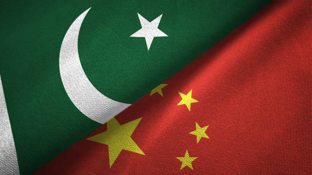 Pakistan and China two flags textile cloth, fabric texture Pakistan and China flags together relations textile cloth, fabric texture pakistani flag stock pictures, royalty-free photos & images