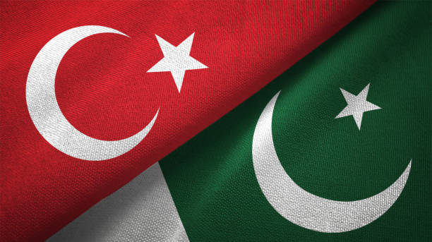 Pakistan and Turkey two flags together textile cloth fabric texture Pakistan and Turkey flag together realtions textile cloth fabric texture pakistan flag stock pictures, royalty-free photos & images