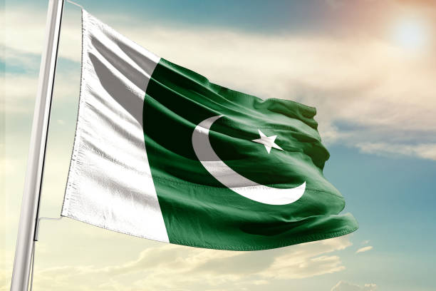 Pakistan flag pakistan flag with beautiful sky pakistan flag stock pictures, royalty-free photos & images