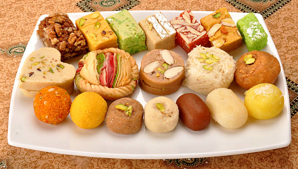 Pakistani Mithai A group of delicious and famous Pakistani and Indian Sweets mithai stock pictures, royalty-free photos & images