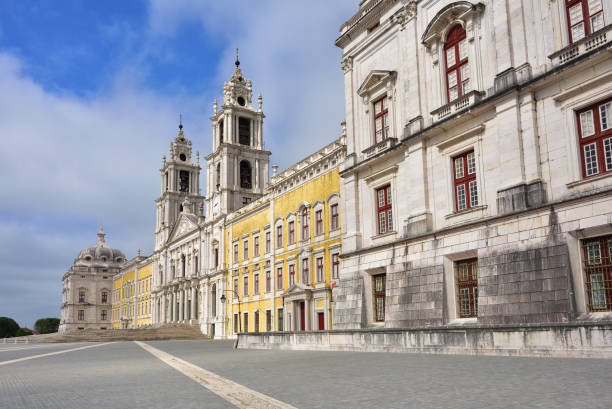 Palace of Mafra Portugal Facade of the Basilica at the Palace of Mafra Portugal a famous royal palace built in the 18th Century mafraq stock pictures, royalty-free photos & images