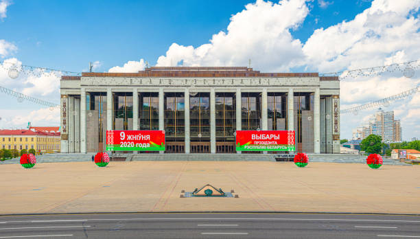 Palace of the Republic palatial government building Minsk, Belarus, July 26, 2020: Palace of the Republic palatial government building with Presidential elections advertising announcement poster on October Square and Independence Avenue, blue sky minsk stock pictures, royalty-free photos & images
