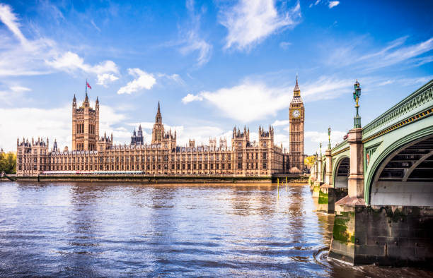 Palace of Westminster, centre of British democracy A view across the River Thames of Westminster Bridge leading towards the Palace of Westminster, home of the House of Commons, the House of Lords, and Big Ben. big ben stock pictures, royalty-free photos & images